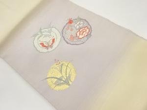 丸に蝶・花々模様刺繍名古屋帯